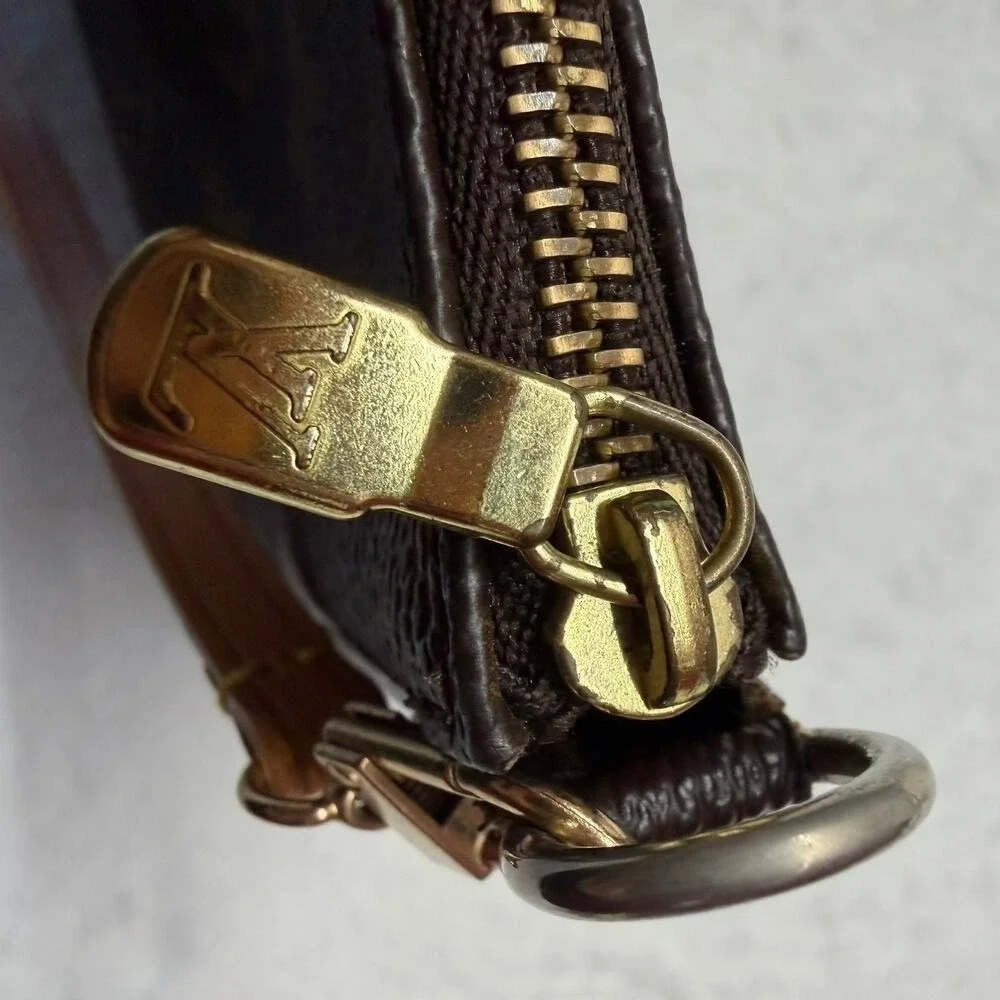 Louis Vuitton Monogram Pochette Accessories Brown Vachetta Strap